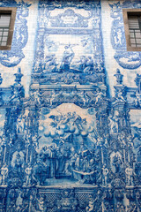 Picturesque historic Azulejo tiles at the exterior of chapel Almas de Santa Catarina in Porto