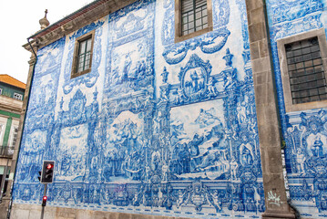 Picturesque historic Azulejo tiles at the exterior of chapel Almas de Santa Catarina in Porto