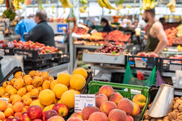 Delicious fruits and vegetables in the Bolhao market hall in Porto