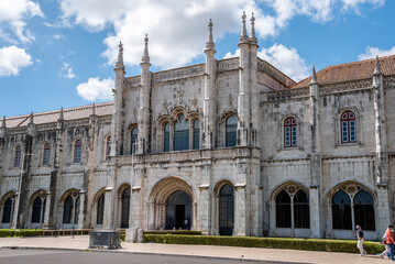 Picturesque facade and main entrance to famous Jeronimos monastery in Lisbon, a manueline architectural masterpiece