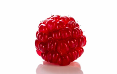 Close-up of a raspberry berry isolated on a white background