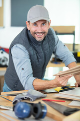 portrait of carpenter working in the workshop