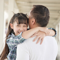 Happy smiling Asian father and daughter staying together, concept image for healthy family, good father, middle aged dad parenting, child development