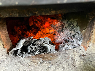 Ashes from charcoal in the furnace that left after heating at high temperatures.