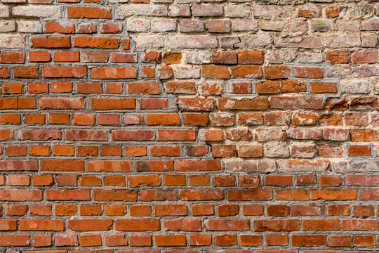 Fototapeta detail of old somewhat dilapidated brick wall