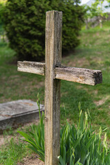 Detail of wooden Christian cross in a cemetery