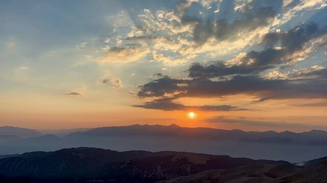 Time lapse of sunset in the mountains