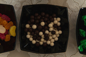 Detail of sweets formed into black and white balls