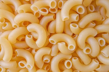 Raw uncooked macaroni , many macaroni background