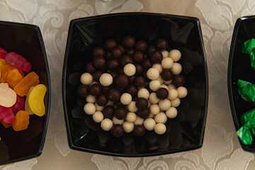 Detail of sweets formed into black and white balls