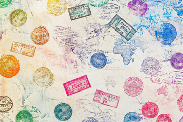 World travel concept with colorful passport stamps on map background for adventure enthusiasts