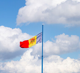 Moldavian flag waving with clouds in the background