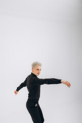 The man dances bachata, kizomba, and salsa himself