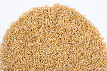 Wheat Cereal Texture Close-up Top View on White Background.