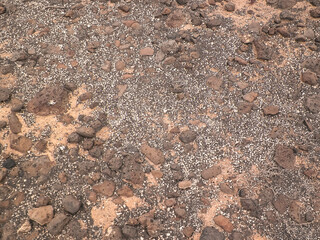 Rocks and sand - desert ground.