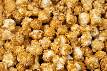 Sweet caramelized popcorn top view close up