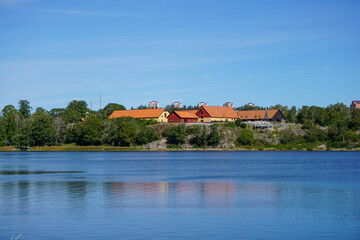 Naklejka premium Scenic view of a lake against blue sky in Sollentuna