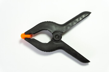 Plastic clip used in photo studio for clamp background and other things