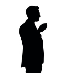 A businessman silhouette standing and drinking coffee, with one hand holding a coffee cup near his mouth