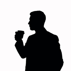 A businessman silhouette standing and drinking coffee, with one hand holding a coffee cup near his mouth