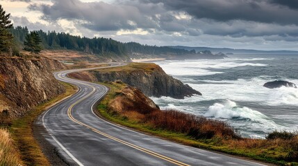 An empty highway curving around a scenic coastal cliff, with ocean waves crashing against the rocks below