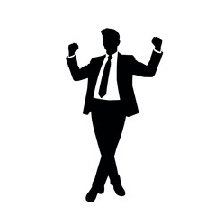 A businessman silhouette standing with a raised fist, giving a motivational gesture