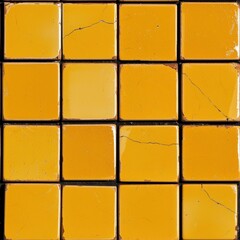 A grid of yellow tiles, featuring various shades and slight imperfections, creates a vibrant, textured surface.