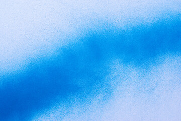 スプレー塗料で塗られた青色の背景