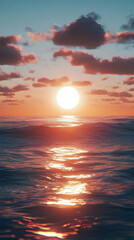 Beautiful sunset over the ocean with the sun reflecting on the water -