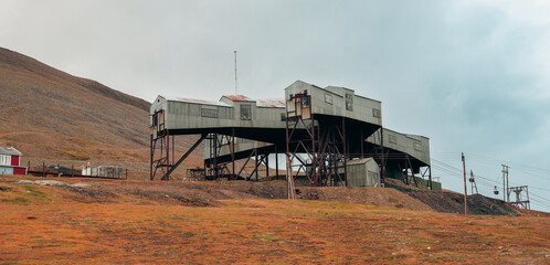 Exploring the abandoned coal mine structures in Longyearbyen, Svalbard during autumn © Dave