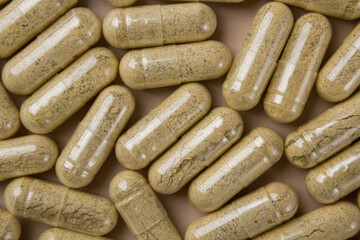 Vitamin capsules full screen as background. Supplements for health