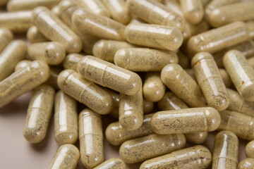 Vitamin capsules on a light background. Dietary supplements for health