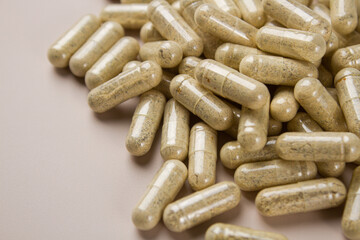 Vitamin capsules on a light background. Dietary supplements for health