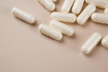 Vitamin capsules on a light background. Dietary supplements for health