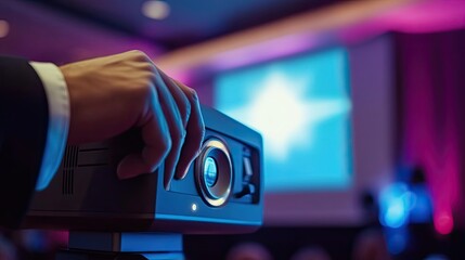 Hand Adjusting a Projector Lens in a Conference Room