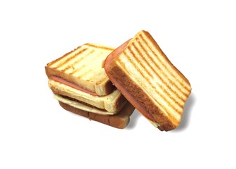 Photo of three grilled ham and cheese sandwiches, isolated on a white background.