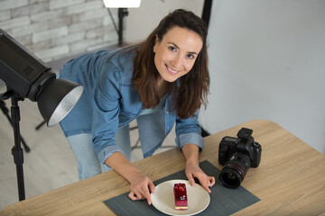 woman vlogger baking and recording video for food channel