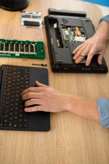 Fototapeta premium an engineer fixing broken computer motherboard