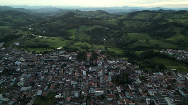 reverser aerial dolly of the beautiful and touristic city of South of Minas Gerais, Bueno Brandao, a city surrounded by Serra da Mantiqueira, famous for its waterfalls and green chill life. - Brazil