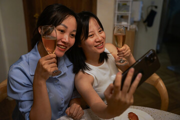 Two Asian women night party at home