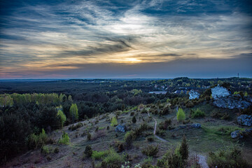 cloudy sunset over forest