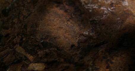 Close-up of Dark Brown Rock Surface with Natural Textures