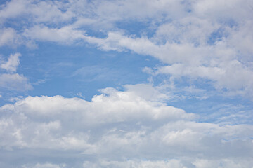 The blue sky and white clouds on a clear day are perfect for the background.