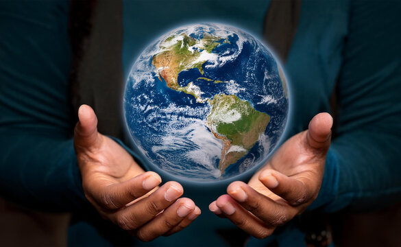 Two hands holding a realistic globe