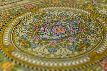 Background screensaver with oriental theme. An old medieval oriental item that has a national heritage in religion