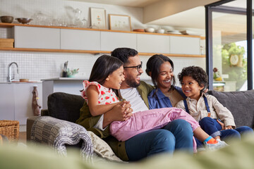 Happy multiethnic family with children having fun together