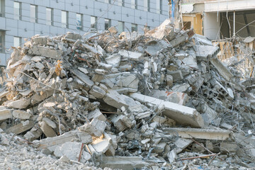 The wreckage of a demolished building. A pile of construction waste on a construction site....