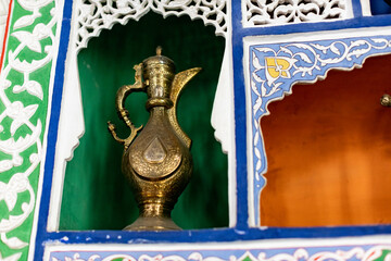 Background screensaver with oriental theme. An old medieval oriental item that has a national heritage in religion