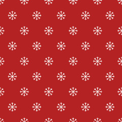 Christmas seamless pattern with snowflakes on red background. Perfect for wallpaper, gift paper, winter greeting cards. Vector illustration