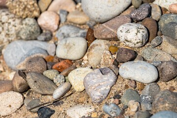 Natural background with stones on the sand